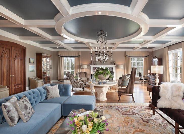 Living Room With Detailed Ceiling in Wycoff